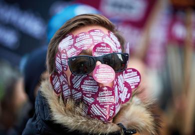 Face covered with UCU stickers