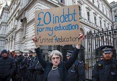 Protester dressed as Prime Minister Theresa May