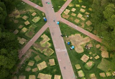 A drone view shows marks left by tents next to signs as people pack up to leave a protest encampment, organised in support of Palestinians in Gaza, after protesters agreed to voluntarily end the camp at the University of Washington in Seattle, 20 May 2024