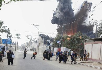 A bomb explodes in Gaza, illustrating the war's threat to academic freedom