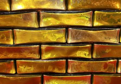 A wall of gold bars, symbolising gold open access in Latin America