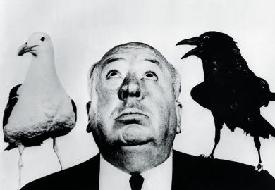 Alfred Hitchcock with seagull and crow on his shoulders