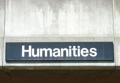 A humanities sign on a university building