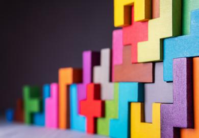 A puzzle of brightly coloured shapes, representing the challenge of working out the best way to design learning for students