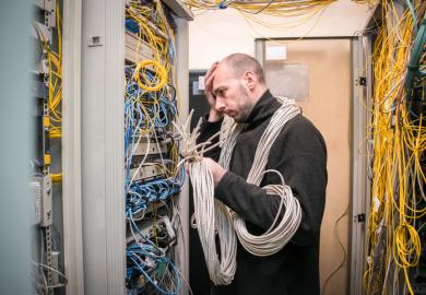 A computer technician gets lost in wires and wishes he had kept things simple.