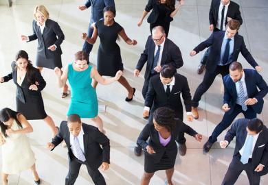 Dancing business people