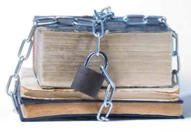 'Copyright' padlock around book