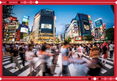 Fisheye view of crowds of people at the famous Shibuya Crossing, Japan. To illustrate paradigm shift needed in Japan’s higher education