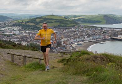 John Grattan running Ironman