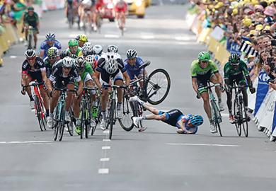 Garmin-Sharp team rider Andrew Talansky of the U.S. crashes during the Tour de France cycling race
