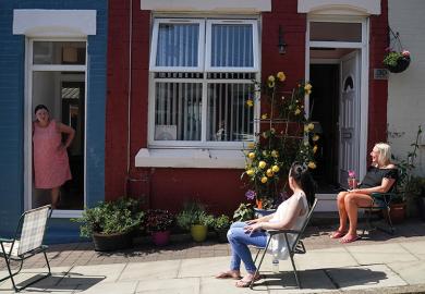 Women outside a house