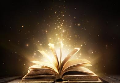 Magic book with shining lights