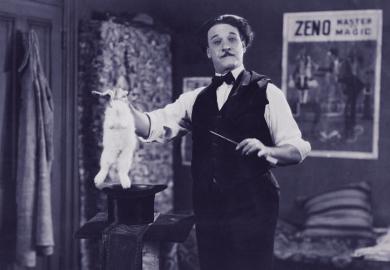 Magician pulls rabbit out of hat