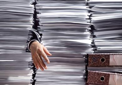 Man grabbing papers