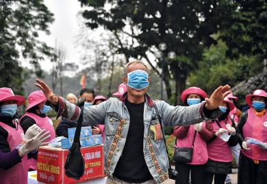 Man with face mask covering eyes