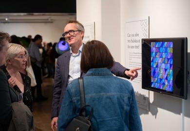John Armstrong with guests at the It All Adds Up exhibition