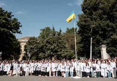 Students of Danylo Halytskyi National Medical University of Lviv put on white doctor's coats during the celebrations for the beginning of the new school year on 29 August, 2025 in Lviv, Ukraine.
