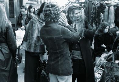 Woman looking in mirror