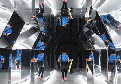 Man reflected in many mirrors