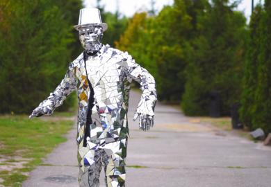 A man made of mirrors symbolising the social sciences' muliple perspectives