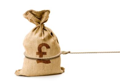 A bag of money being pulled away