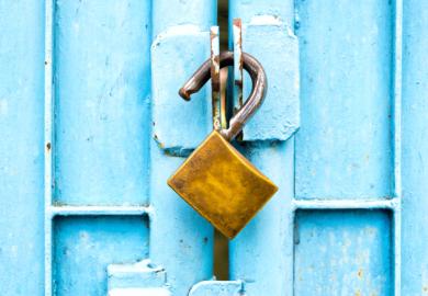 An opened padlock, symbolising open access