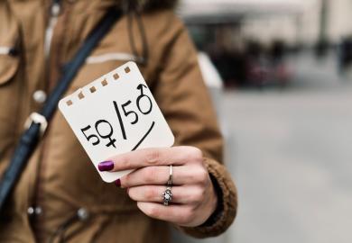 A woman protests against the gender pay gap