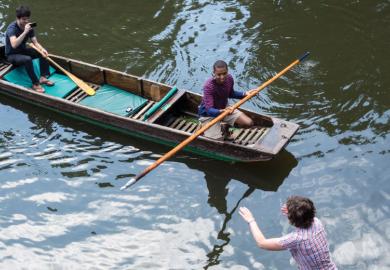 People on boats punting on River Cam, Cambridge