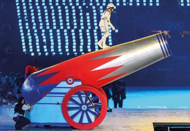 Person preparing to be fired from cannon