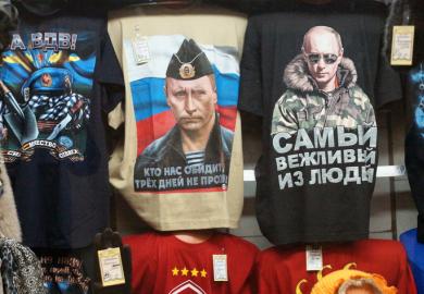Russian president Vladimir Putin pictured on t-shirts in a Moscow shop