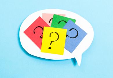 Question marks inside a speech bubble