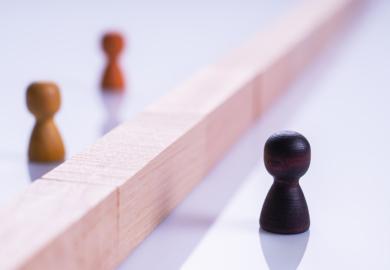 Black and white chess pieces, symbolising racism
