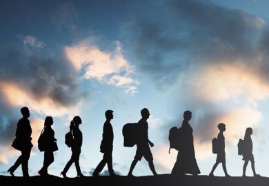 refugees walking