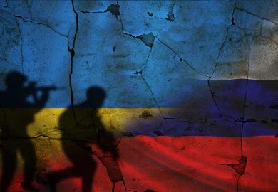 Russian and Ukrainian flags with shadows of soldiers