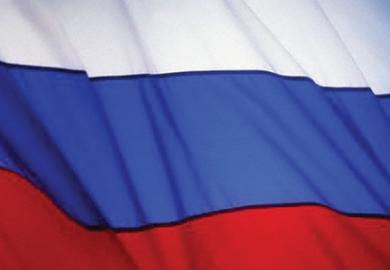 The Russian flag behind barbed wire