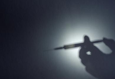 The shadow of a syringe