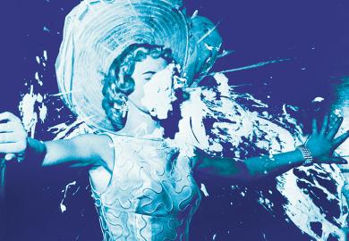 Elegant woman hit with a cream pie illustrating public rudeness in academia