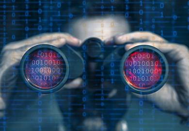 Someone looks through binoculars with binary code in the lenses