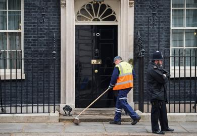 Street cleaner outside Downing Street