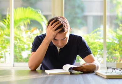 A stressed asian student