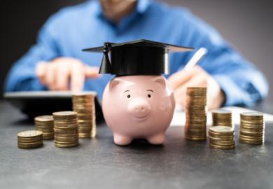 A piggy bank with a mortar board