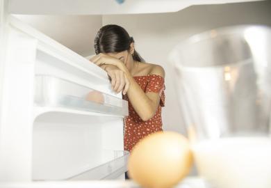 A student depressed by an empty fridge