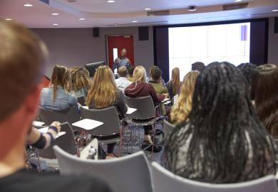 Student lecture in modern university classroom