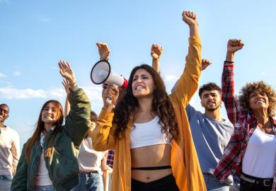 Student protestors with a megaphone
