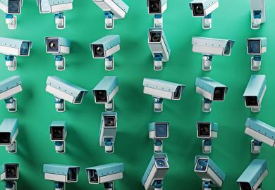 An array of multiple security cameras mounted on a green wall, symbolising surveillance, security, and monitoring. To illustrate that franchise partners must be helped to improve, not just monitored.