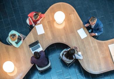 A team of people working together at a university