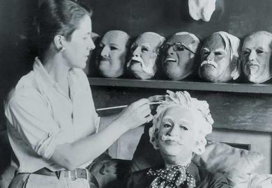 Woman making a mask of Albert Einstein