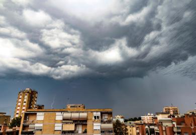 Thunderstorm gathering over city