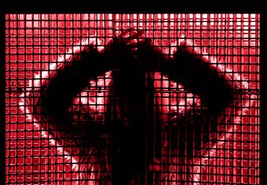 Silhouette of young woman behind window