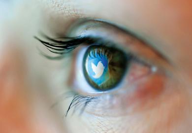 Twitter logo reflected on person's eye